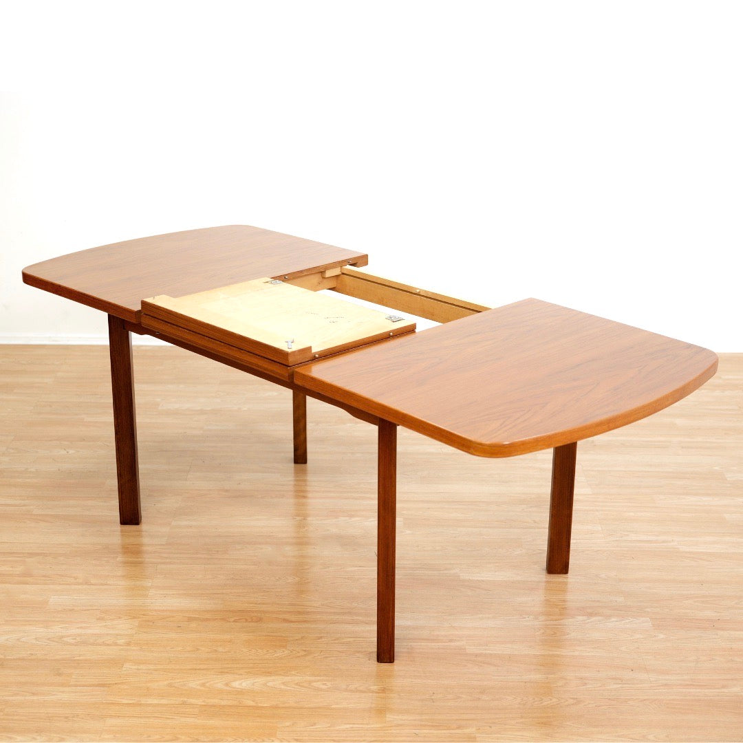 1970S TEAK EXTENDING DINING TABLE MADE IN GERMANY