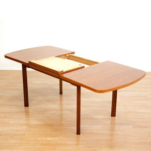 1970S TEAK EXTENDING DINING TABLE MADE IN GERMANY