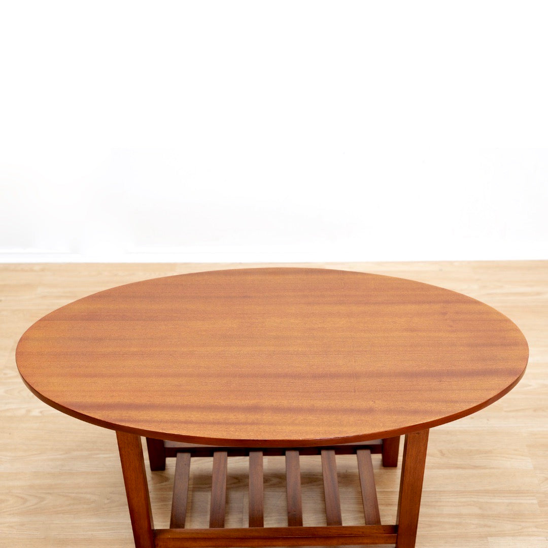 MID CENTURY OVAL SIDE TABLE IN MAHOGANY