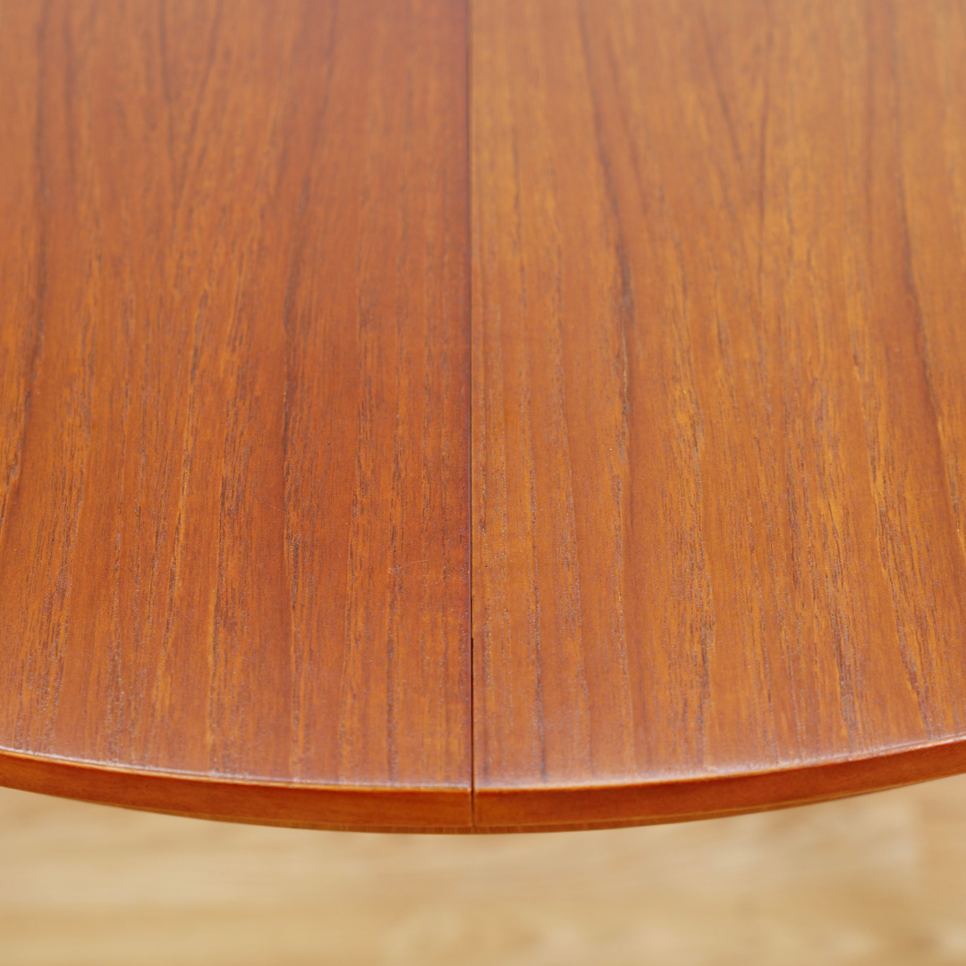 MID CENTURY ROUND TEAK EXTENDING DINING TABLE BY TOM ROBERTSON FOR MCINTOSH OF KIRKCALDY
