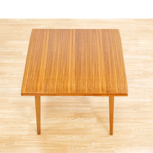 MID CENTURY EXTENDING DINING TABLE AND FOUR CHAIRS BY E GOMME