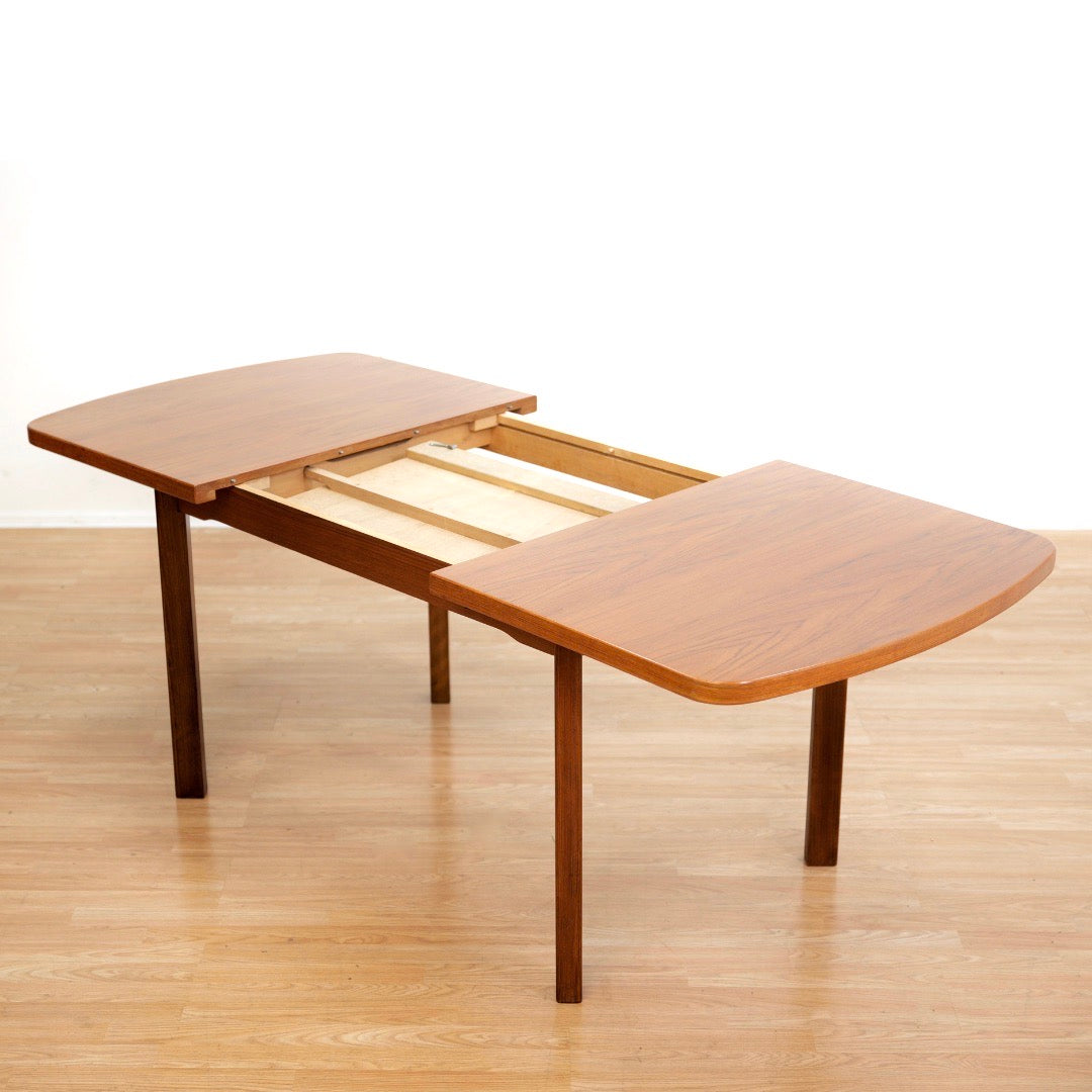 1970S TEAK EXTENDING DINING TABLE MADE IN GERMANY
