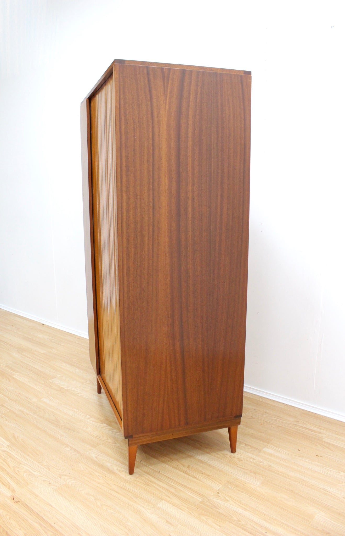 MID CENTURY ARMOIRE BY AUSTINSUITE FURNITURE