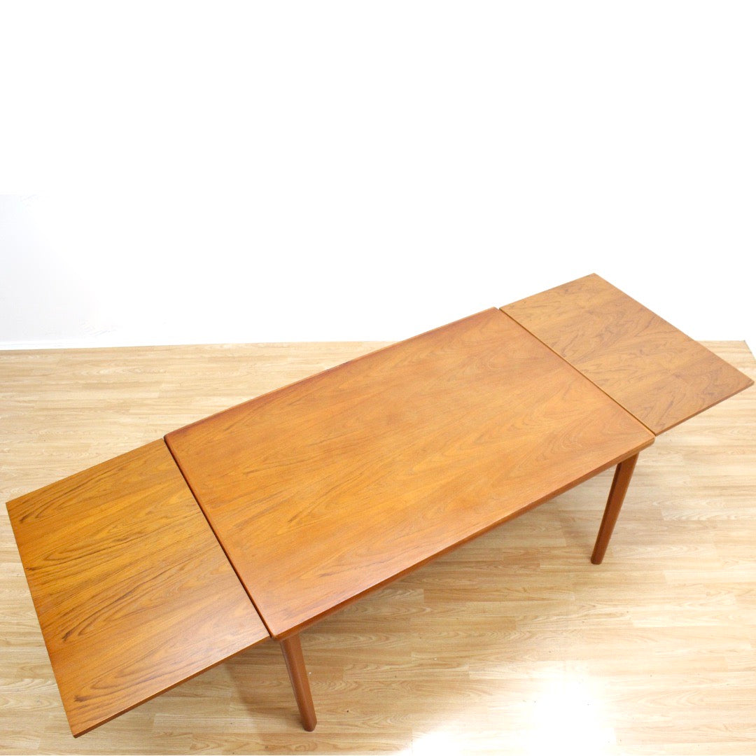 LARGE MID CENTURY TEAK EXTENDING DINING TABLE BY AM MOBLER