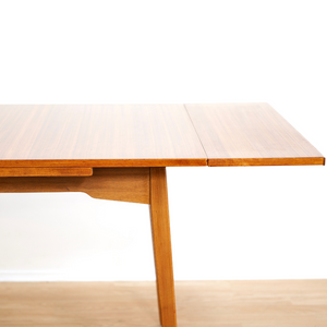 MID CENTURY EXTENDING DINING TABLE AND FOUR CHAIRS BY E GOMME