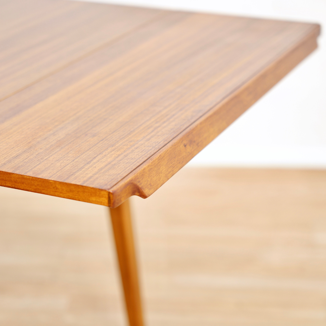 MID CENTURY EXTENDING DINING TABLE AND FOUR CHAIRS BY E GOMME