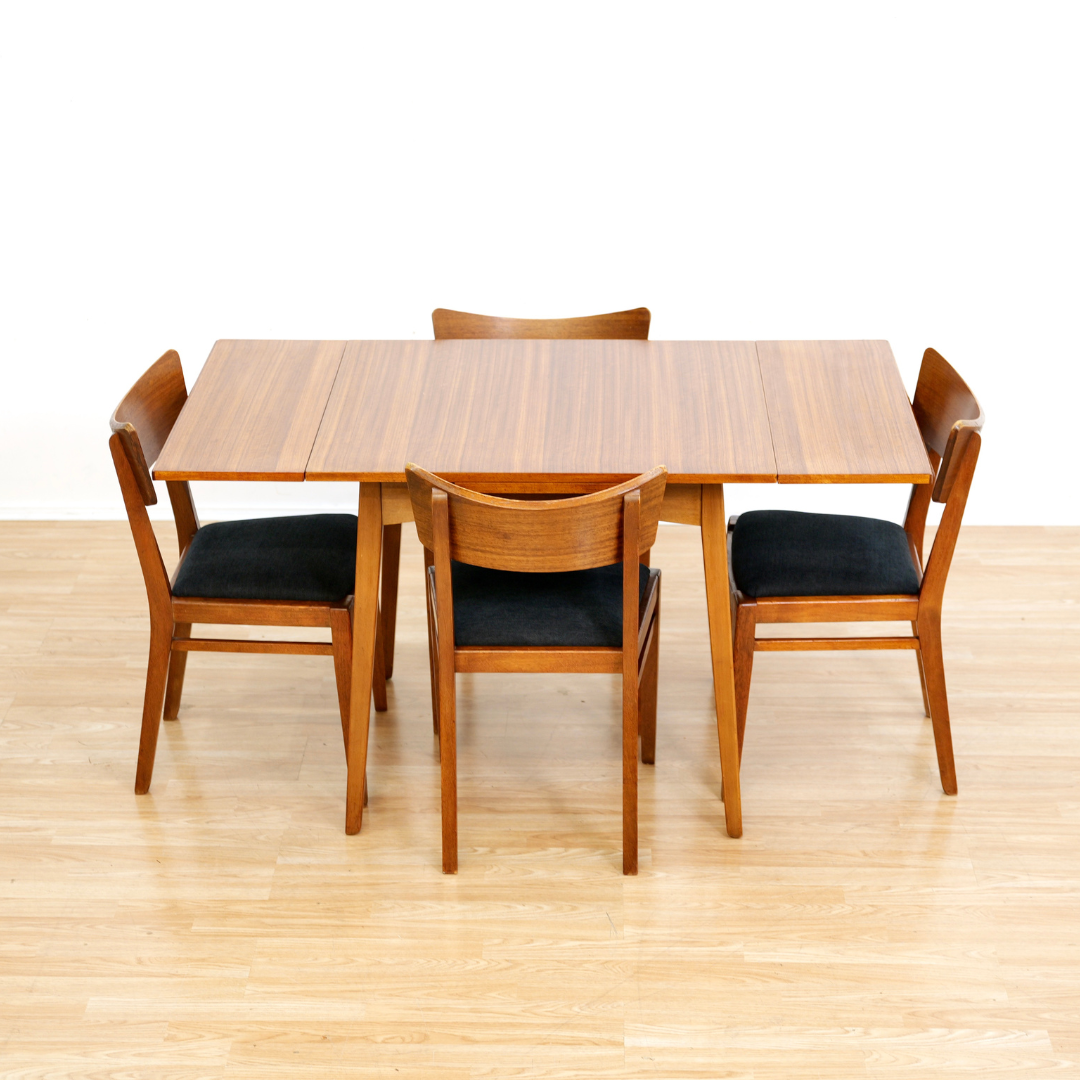 MID CENTURY EXTENDING DINING TABLE AND FOUR CHAIRS BY E GOMME