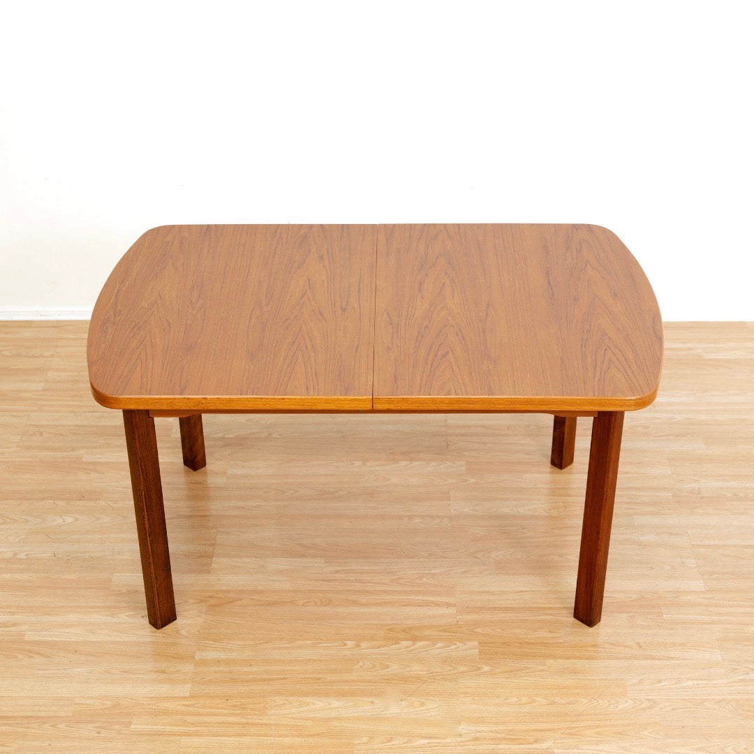 1970S TEAK EXTENDING DINING TABLE MADE IN GERMANY