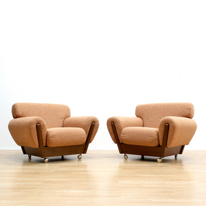 PAIR OF MID CENTURY LOUNGE CHAIRS IN ORANGE WEAVE BOUCLE