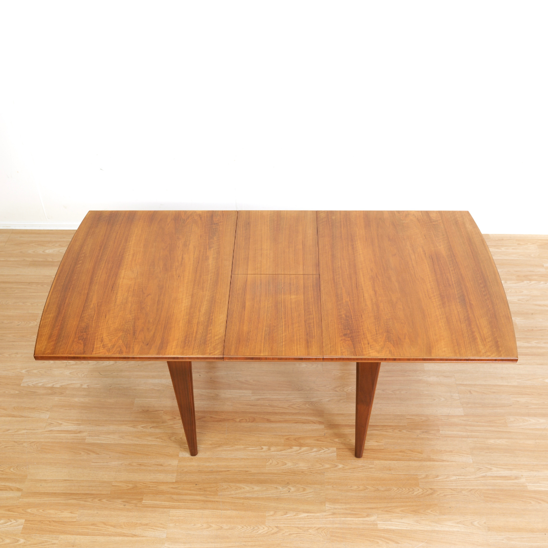 MID CENTURY ENGLISH WALNUT EXTENDING DINING TABLE BY ALFRED COX