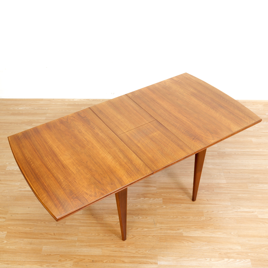 MID CENTURY ENGLISH WALNUT EXTENDING DINING TABLE BY ALFRED COX