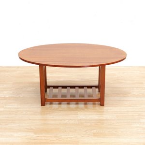 MID CENTURY OVAL SIDE TABLE IN MAHOGANY