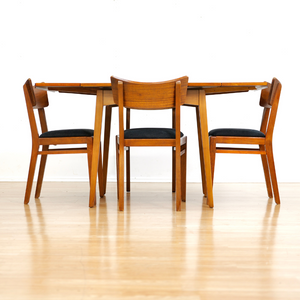 MID CENTURY EXTENDING DINING TABLE AND FOUR CHAIRS BY E GOMME