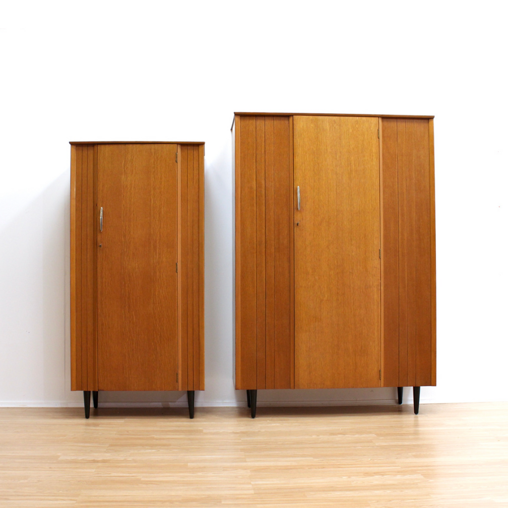 PAIR OF 'HIS AND HER' ARMOIRES BY LEBUS FURNITURE