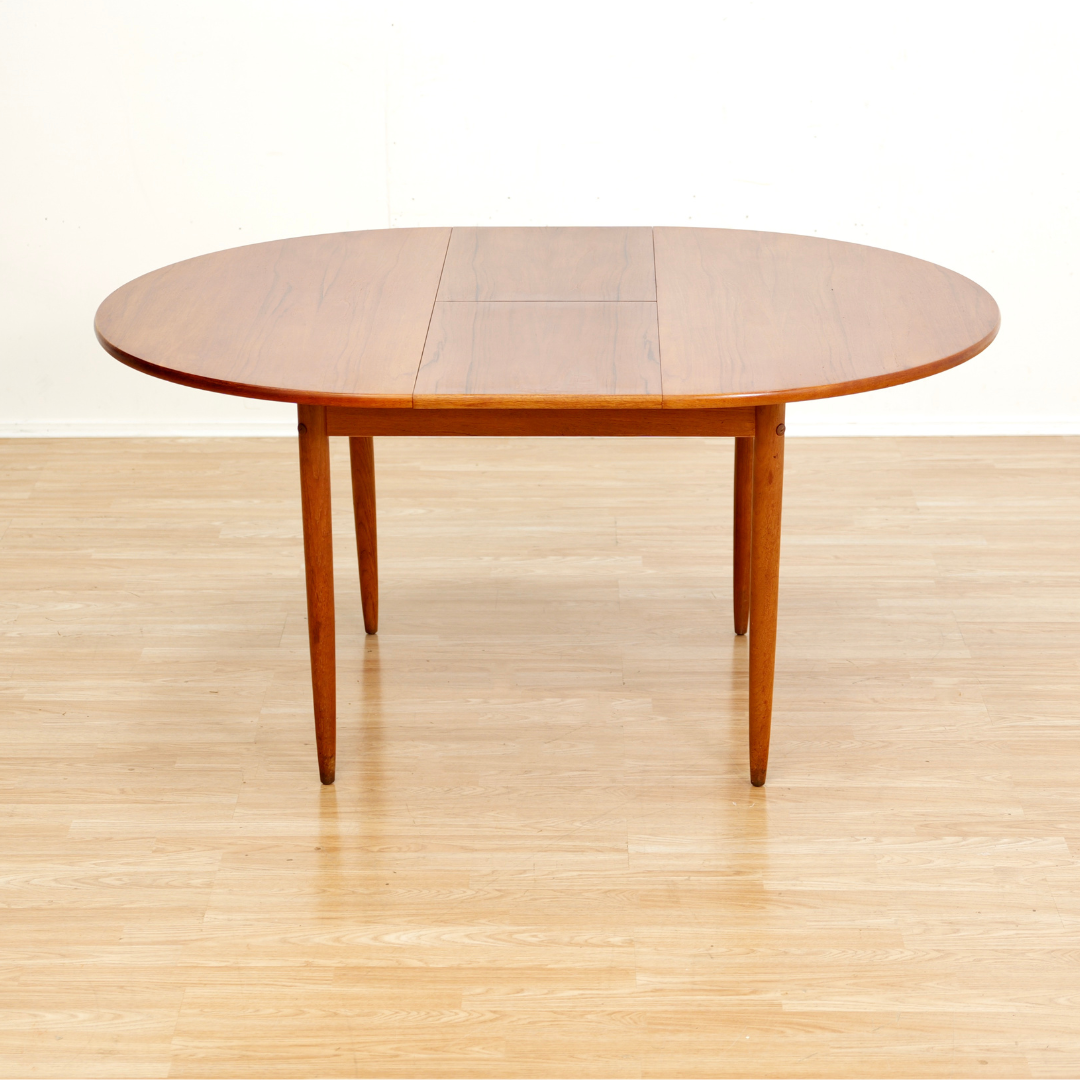 MID CENTURY ROUND TEAK EXTENDING DINING TABLE