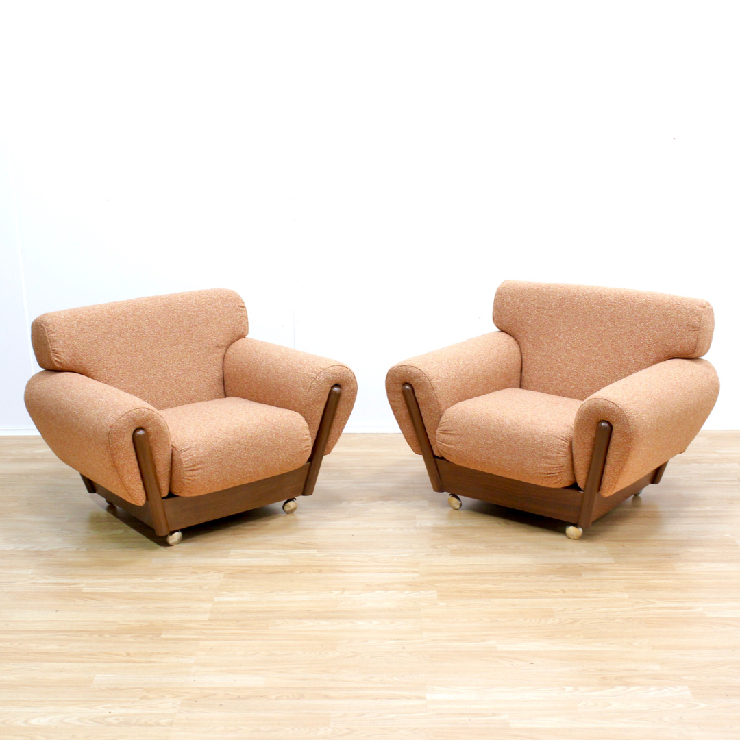 PAIR OF MID CENTURY LOUNGE CHAIRS IN ORANGE WEAVE BOUCLE