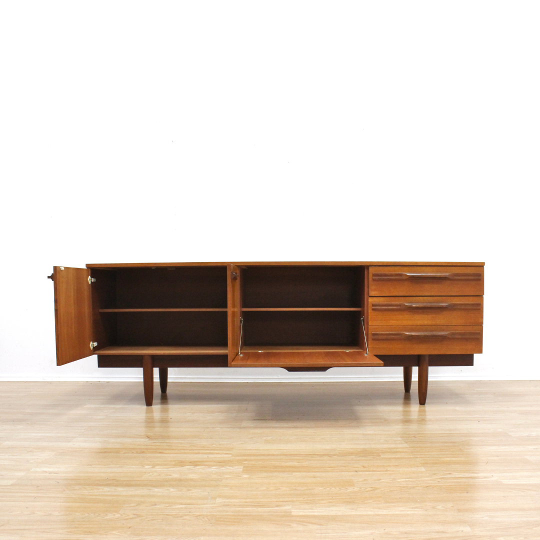 MID CENTURY LONG TEAK CREDENZA BY STONEHILL FURNITURE