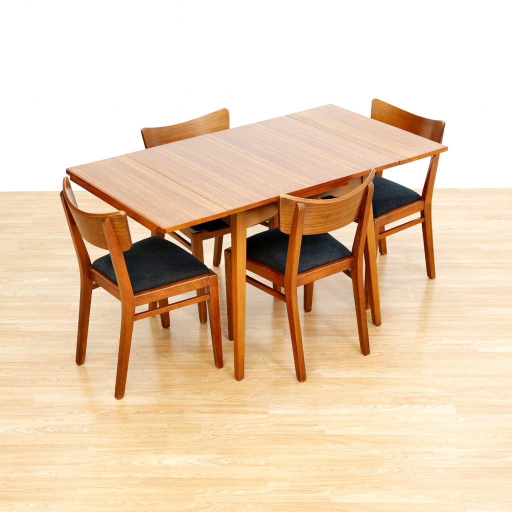 MID CENTURY EXTENDING DINING TABLE AND FOUR CHAIRS BY E GOMME