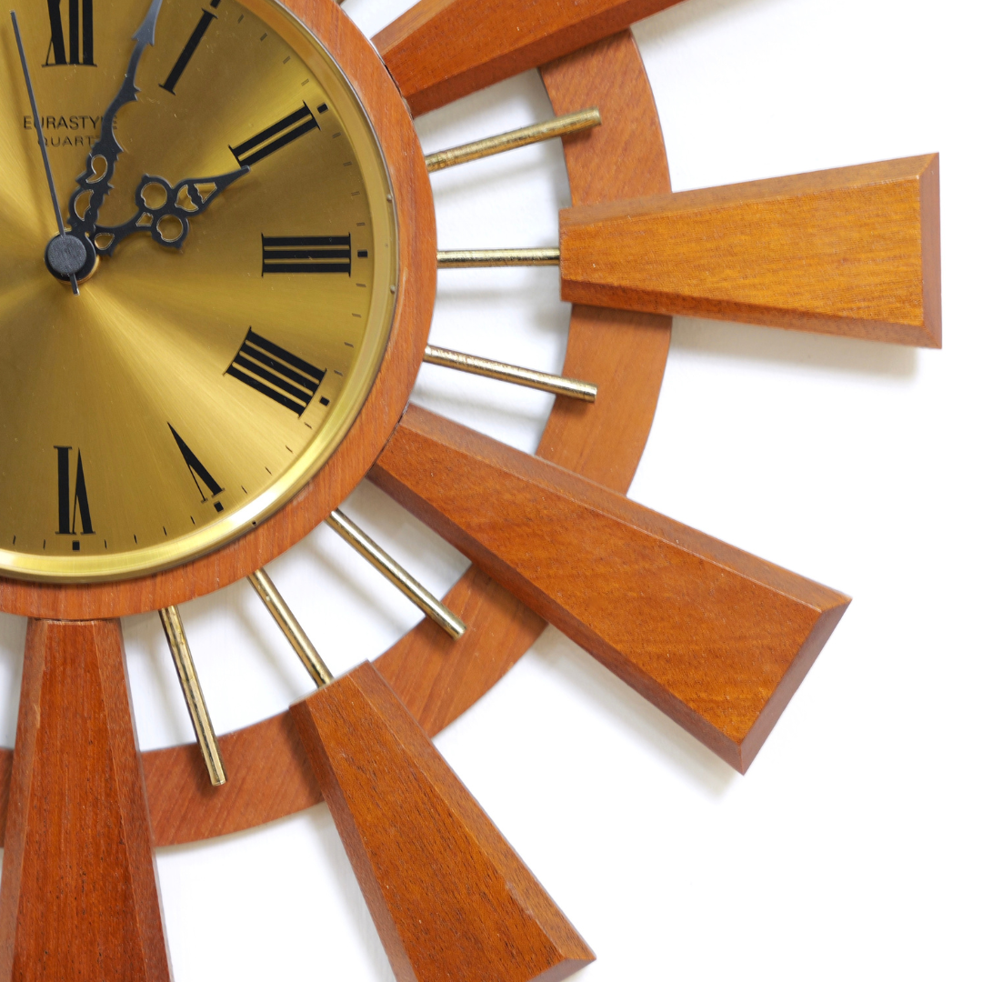 MID CENTURY TEAK SUNBURST WALL CLOCK BY EUROSTYLE