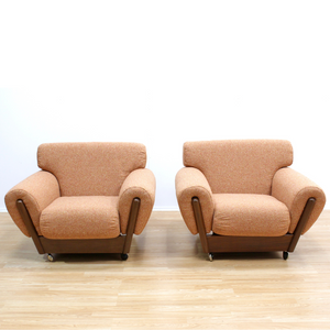 PAIR OF MID CENTURY LOUNGE CHAIRS IN ORANGE WEAVE BOUCLE