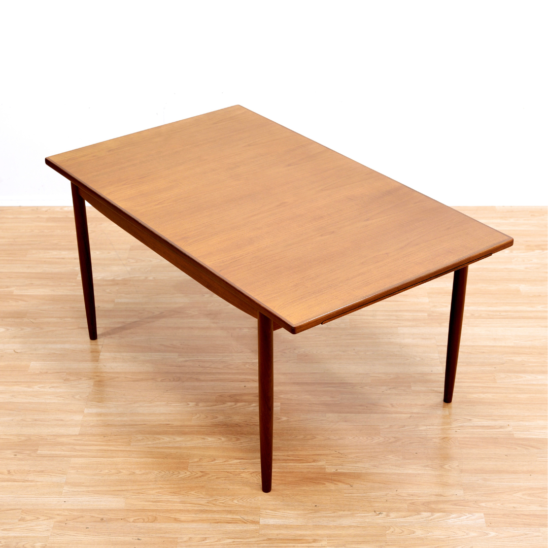 MID CENTURY EXTENDING DINING TABLE BY KOFOD LARSEN