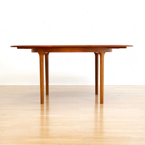 MID CENTURY ROUND TEAK EXTENDING DINING TABLE BY TOM ROBERTSON FOR MCINTOSH OF KIRKCALDY