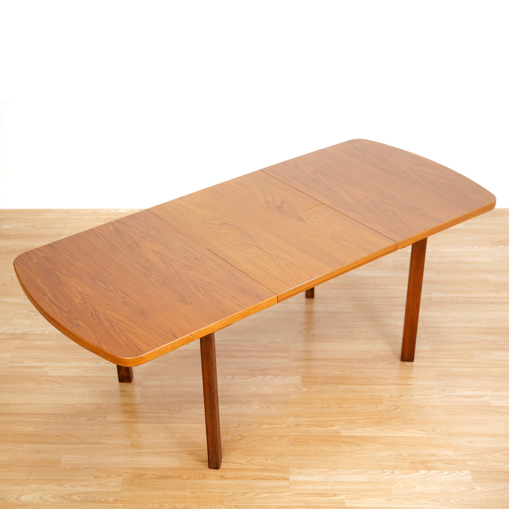 1970S TEAK EXTENDING DINING TABLE MADE IN GERMANY