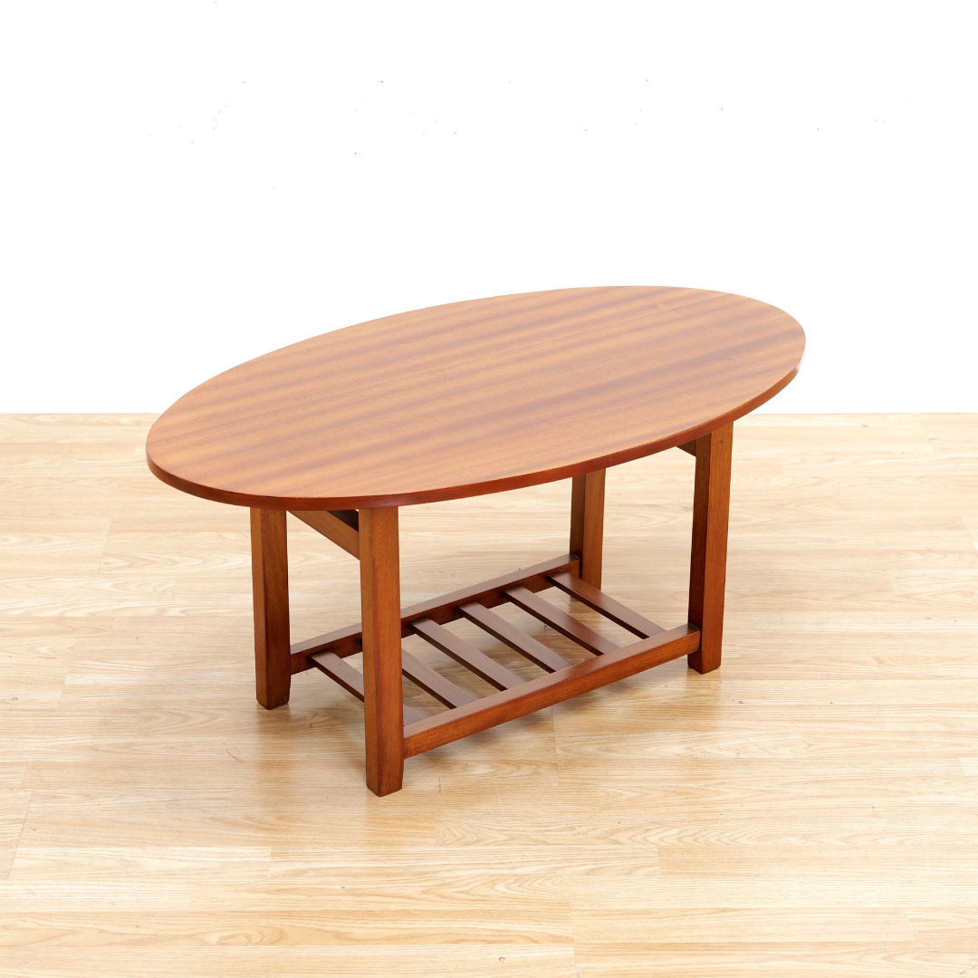MID CENTURY OVAL SIDE TABLE IN MAHOGANY