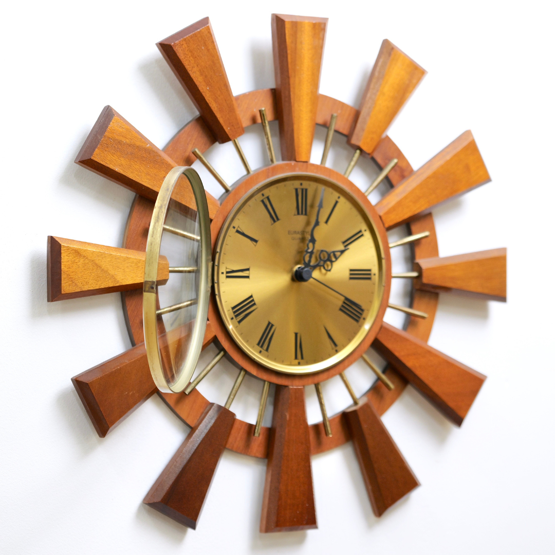MID CENTURY TEAK SUNBURST WALL CLOCK BY EUROSTYLE