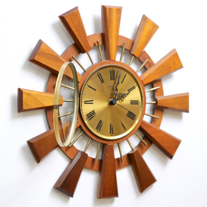 MID CENTURY TEAK SUNBURST WALL CLOCK BY EUROSTYLE
