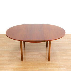 MID CENTURY ROUND TEAK EXTENDING DINING TABLE BY TOM ROBERTSON FOR MCINTOSH OF KIRKCALDY
