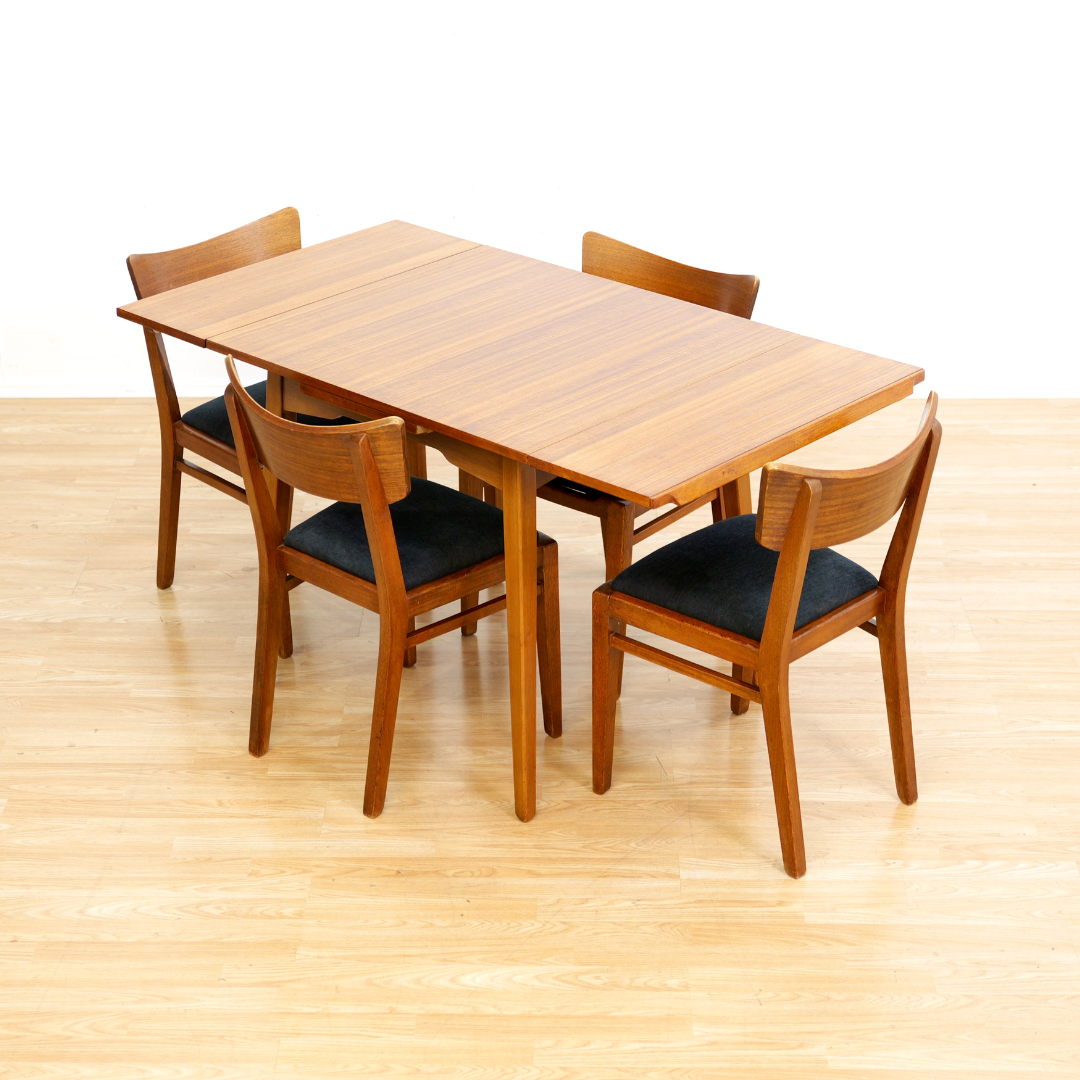 MID CENTURY EXTENDING DINING TABLE AND FOUR CHAIRS BY E GOMME