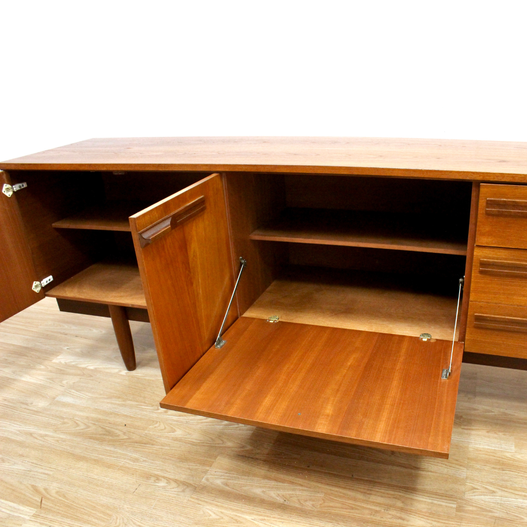 MID CENTURY LONG TEAK CREDENZA BY STONEHILL FURNITURE