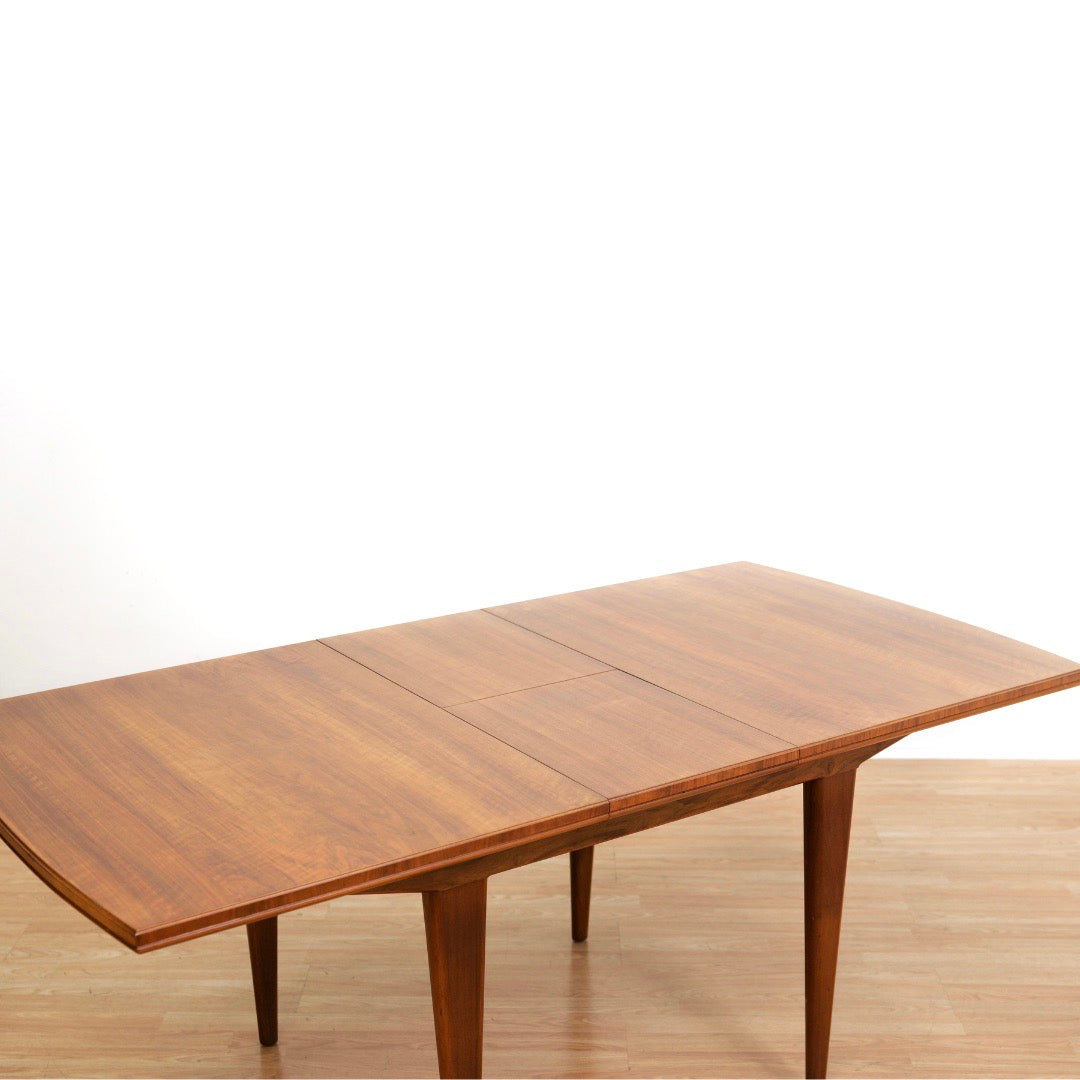 MID CENTURY ENGLISH WALNUT EXTENDING DINING TABLE BY ALFRED COX
