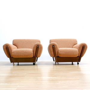 PAIR OF MID CENTURY LOUNGE CHAIRS IN ORANGE WEAVE BOUCLE