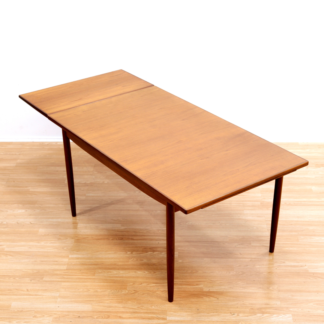 MID CENTURY EXTENDING DINING TABLE BY KOFOD LARSEN