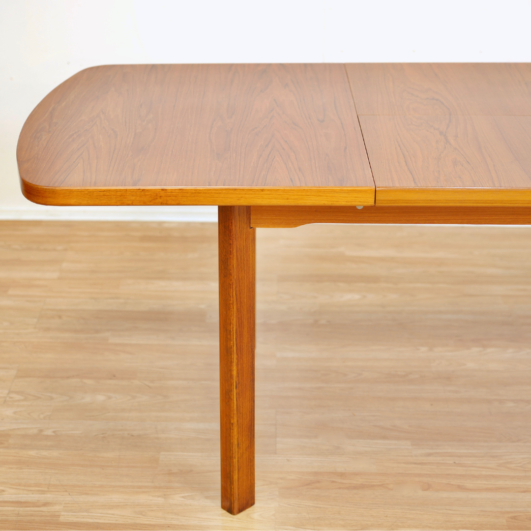 1970S TEAK EXTENDING DINING TABLE MADE IN GERMANY
