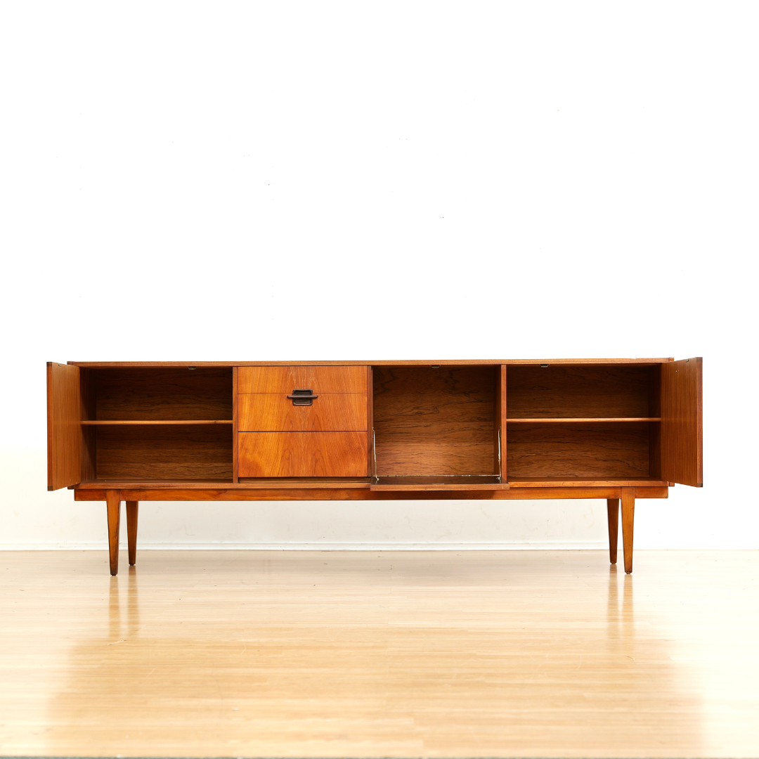 MID CENTURY TEAK CORINTHIAN CREDENZA BY NATHAN FURNITURE