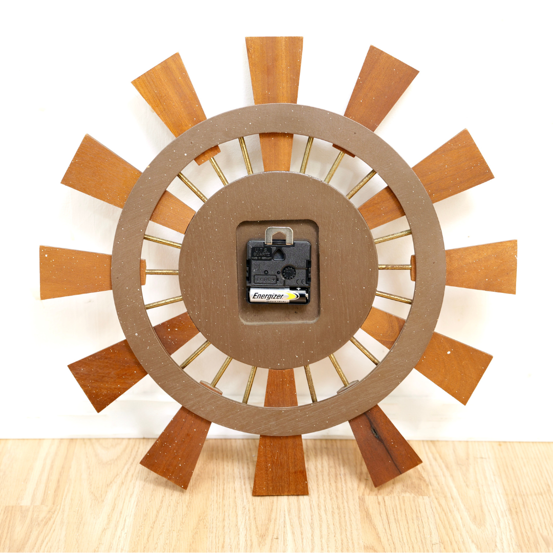 MID CENTURY TEAK SUNBURST WALL CLOCK BY EUROSTYLE