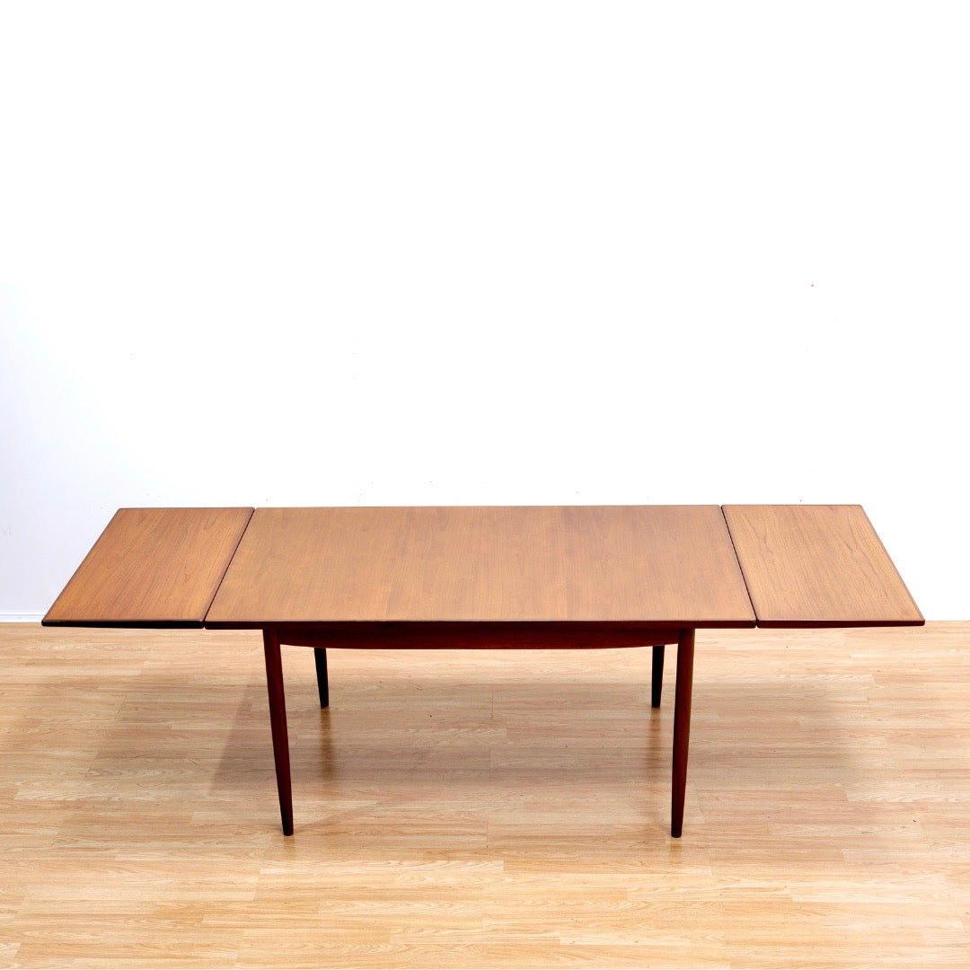 MID CENTURY EXTENDING DINING TABLE BY KOFOD LARSEN