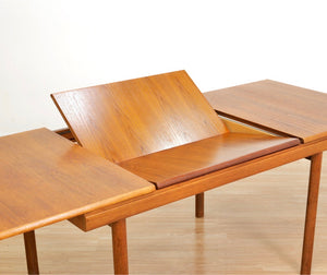 1960S EXTENDING TEAK DINING TABLE BY WHITE & NEWTON