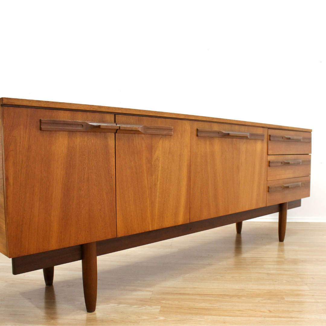 MID CENTURY LONG TEAK CREDENZA BY STONEHILL FURNITURE