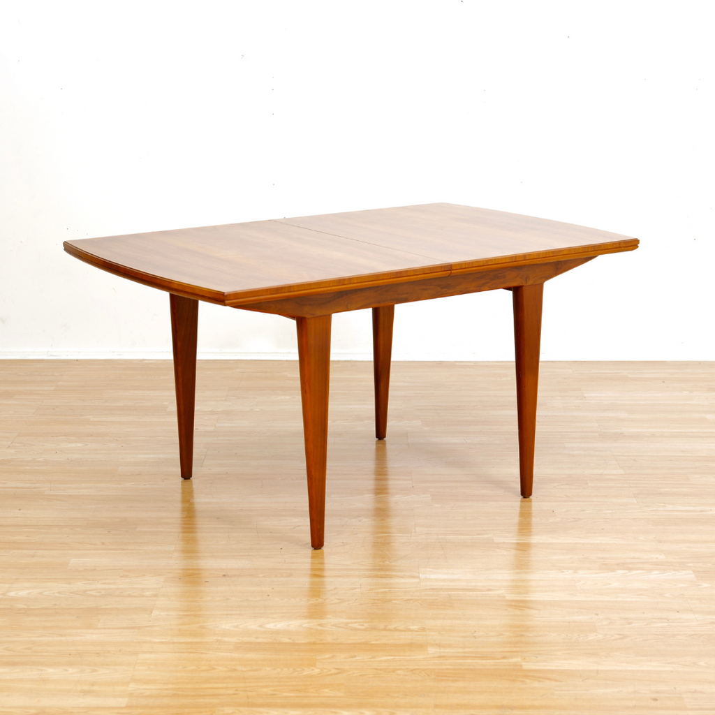 MID CENTURY ENGLISH WALNUT EXTENDING DINING TABLE BY ALFRED COX