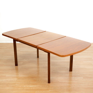 1970S TEAK EXTENDING DINING TABLE MADE IN GERMANY