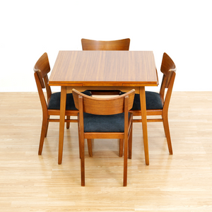 MID CENTURY EXTENDING DINING TABLE AND FOUR CHAIRS BY E GOMME