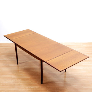 MID CENTURY EXTENDING DINING TABLE BY KOFOD LARSEN