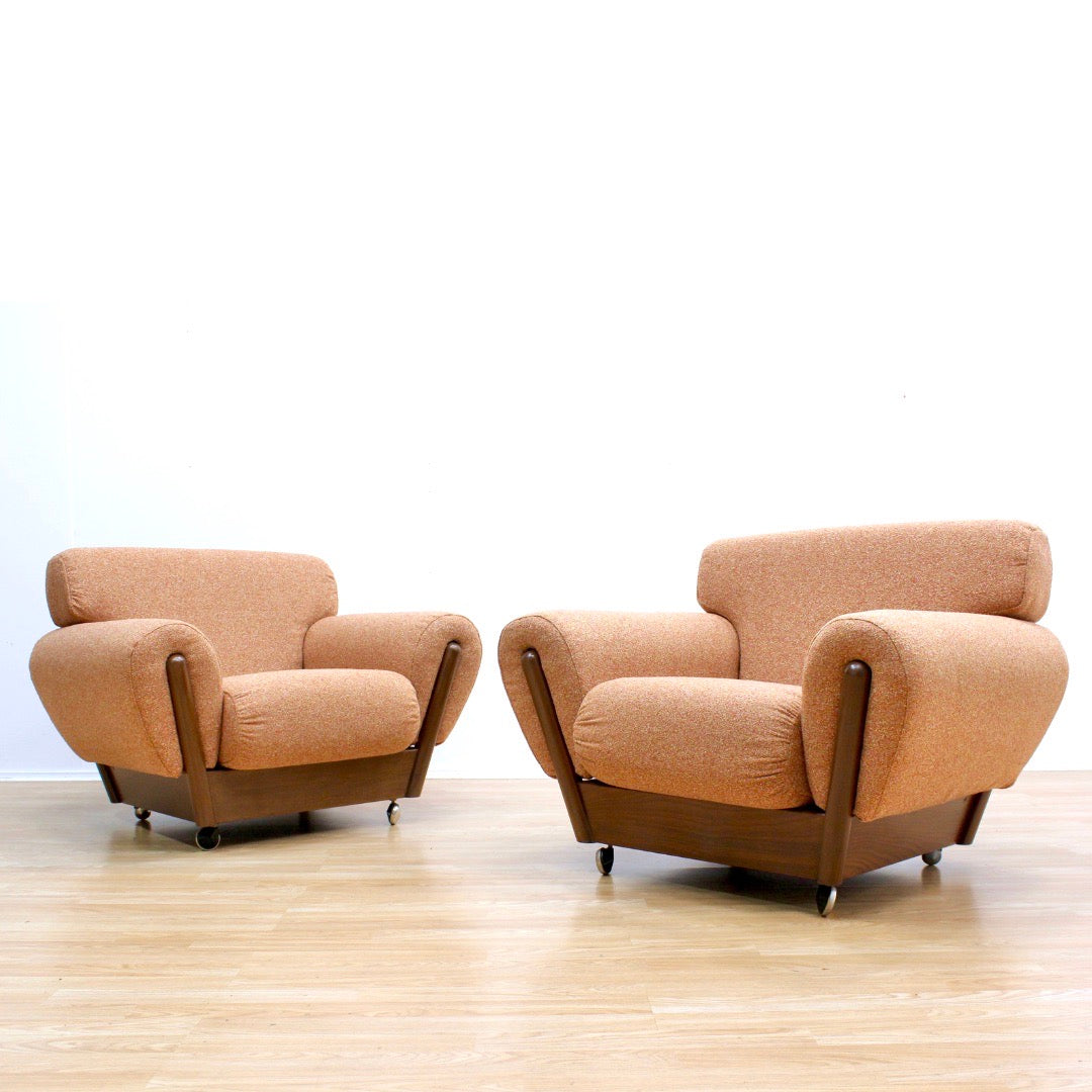 PAIR OF MID CENTURY LOUNGE CHAIRS IN ORANGE WEAVE BOUCLE