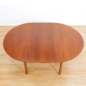 MID CENTURY ROUND TEAK EXTENDING DINING TABLE BY TOM ROBERTSON FOR MCINTOSH OF KIRKCALDY