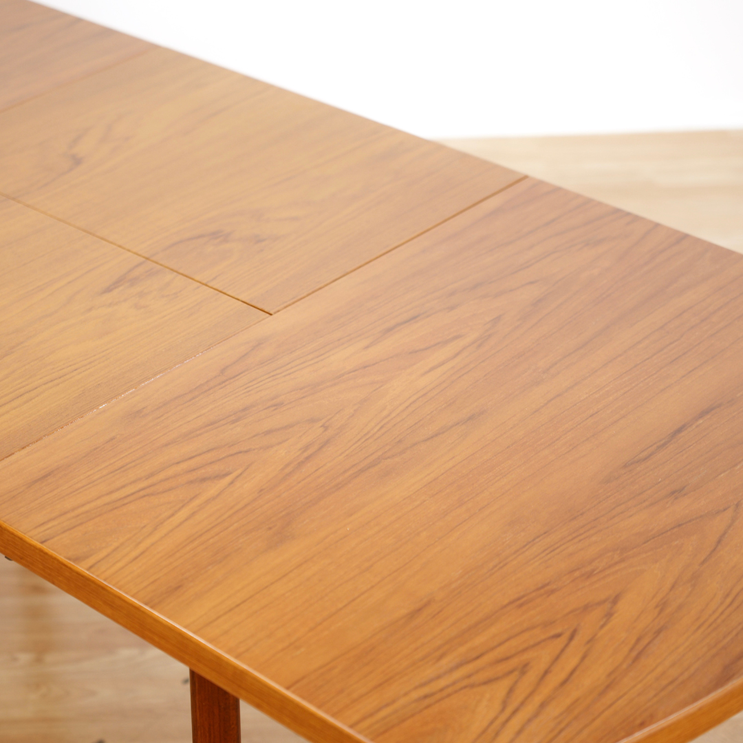 1970S TEAK EXTENDING DINING TABLE MADE IN GERMANY