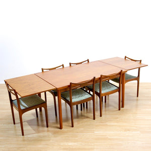 LARGE MID CENTURY TEAK EXTENDING DINING TABLE BY AM MOBLER